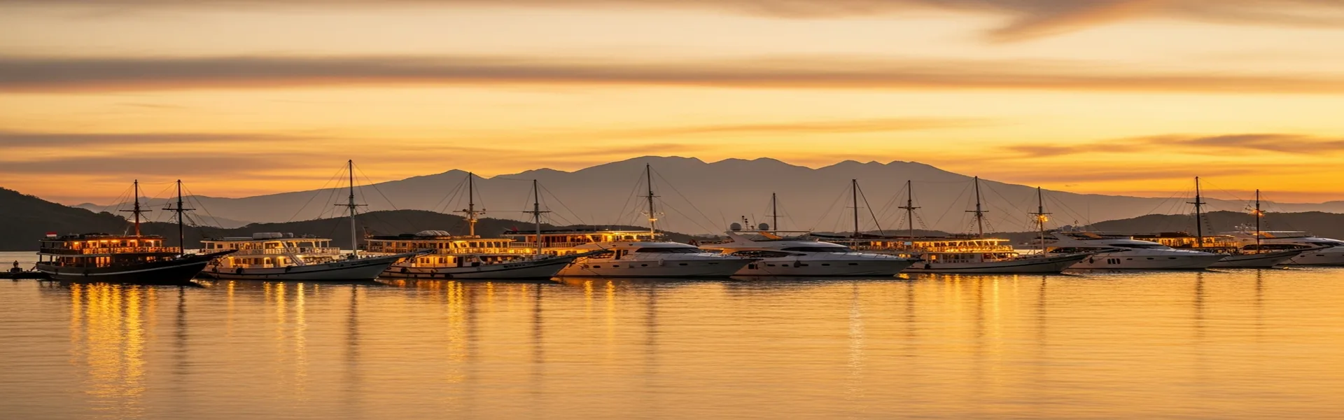 Komodo Private Cruise team and fleet in Labuan Bajo harbor
